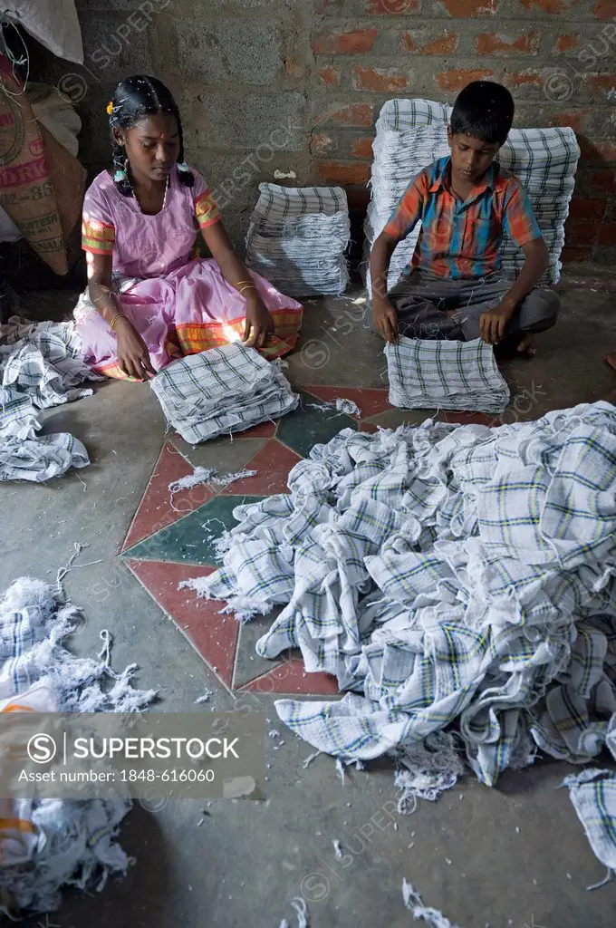 Girl, 13 years, and boy working in a towel production, child labourers, Karur, Tamil Nadu, South India, India, Asia