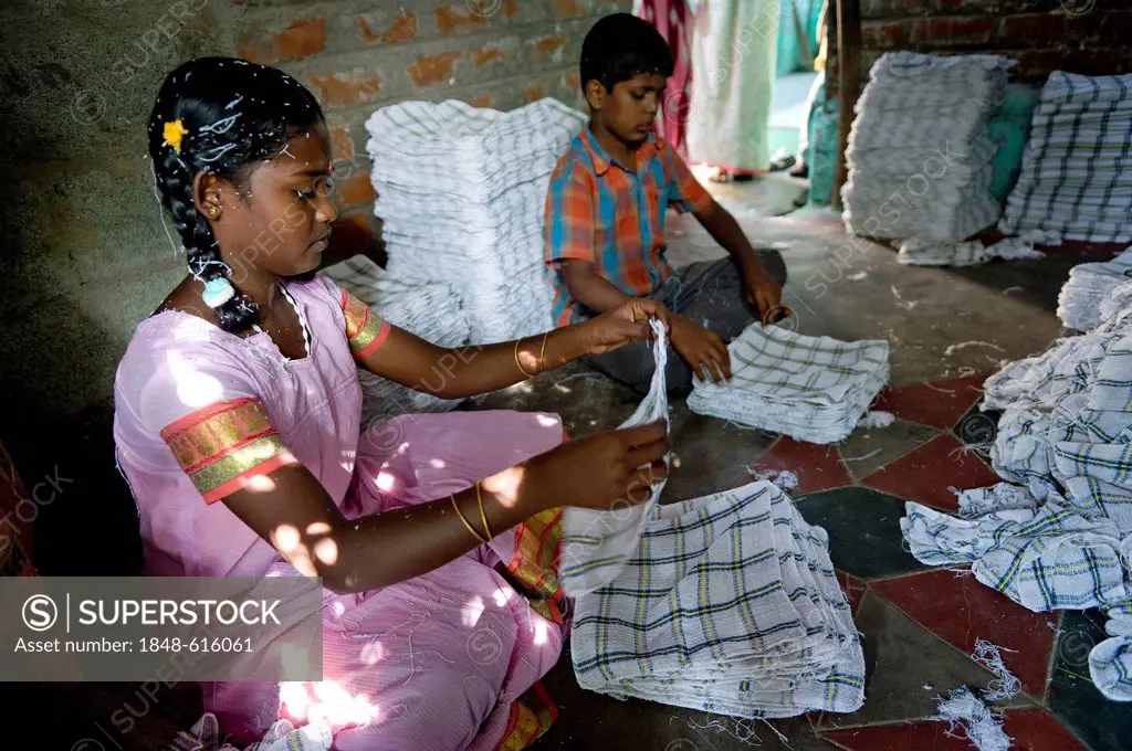 Girl, 13 years, and boy working in a towel production, child labourers, Karur, Tamil Nadu, South India, India, Asia