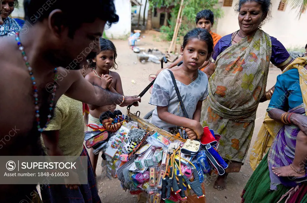 Girl, 13 years, returns home after work with a mobile sales stall, child labourer, Karur, Tamil Nadu, South India, India, Asia
