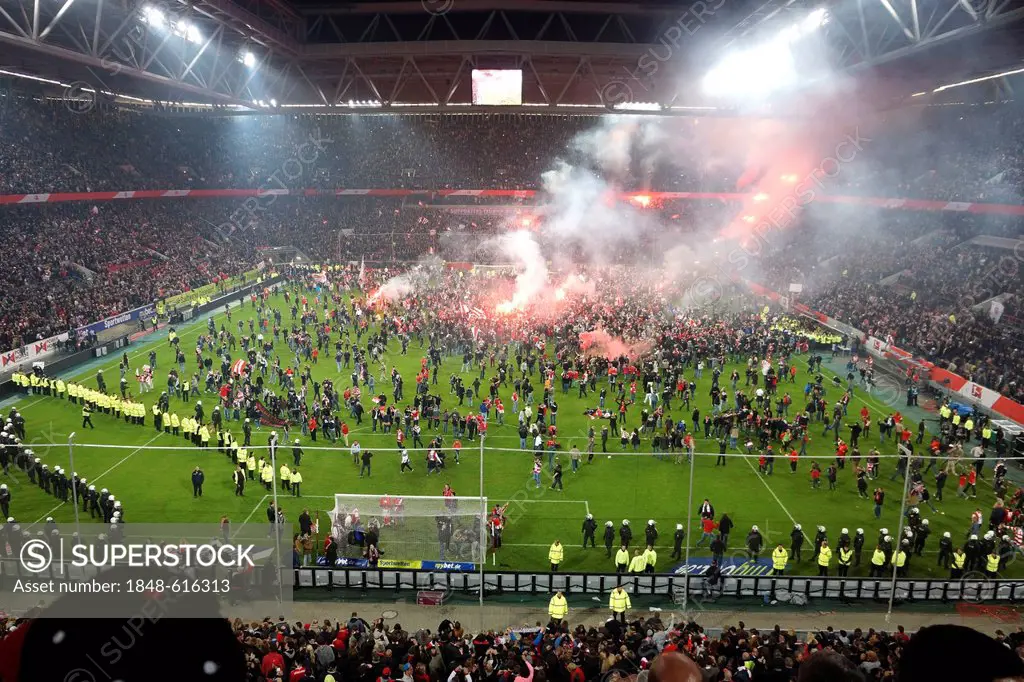 Fans during a pitch invasion, rioting on the pitch, during the relegation match Fortuna Duesseldorf vs. Herta BSC Berlin, Espirt Arena, Duesseldorf, N...