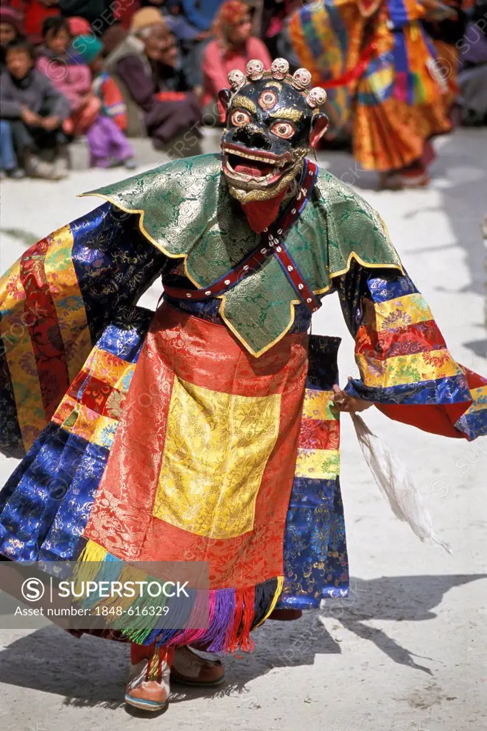 Cham dancer with a red mask, Tibetan mask dance, Tibetan monastery festival, Sani at Padum, Zanskar, Ladakh, Jammu and Kashmir, Indian Himalayas, Nort...