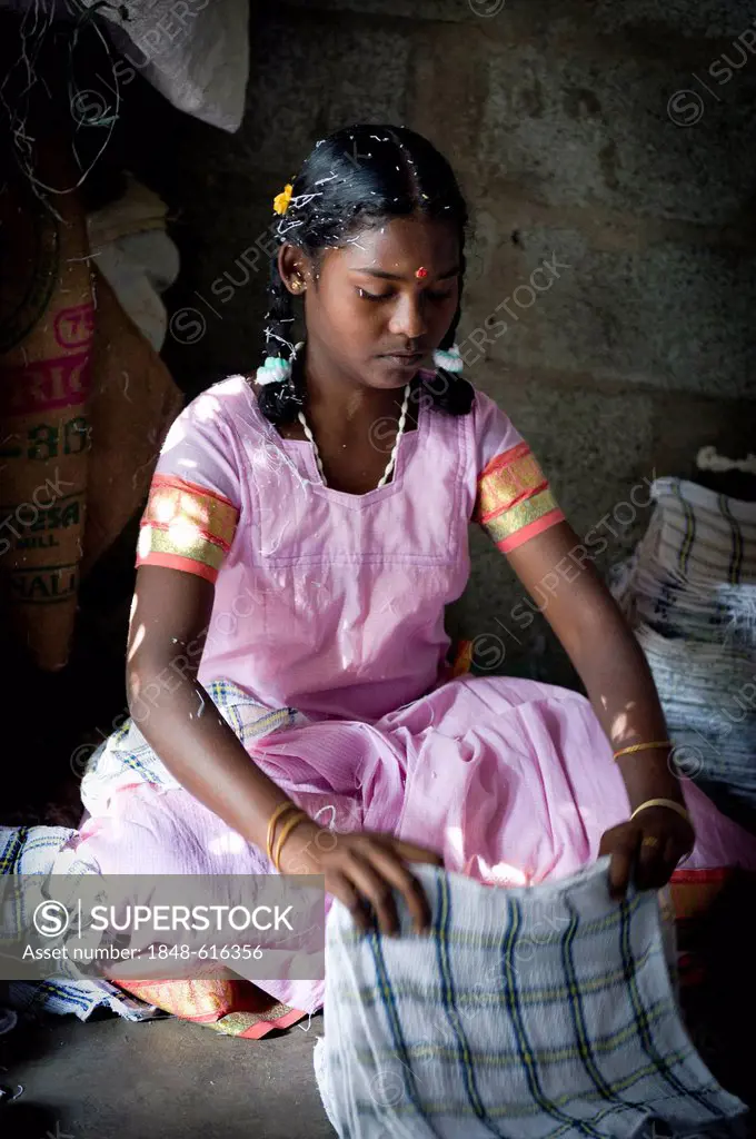 Girl, 13 years, working in a towel production, child labourer, Karur, Tamil Nadu, South India, India, Asia