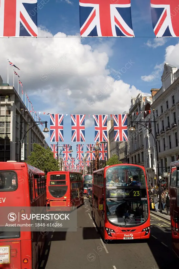 Traffic on Oxford Street, double-decker buses, Union Jack, national flag, London, England, United Kingdom, Europe