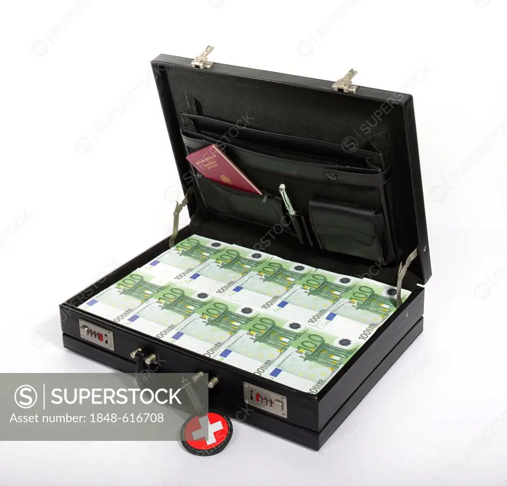 Symbolic image for tax flight to Switzerland, 100-euro banknotes in a briefcase, suitcase of money, luggage tag with a Swiss national flag, German pas...