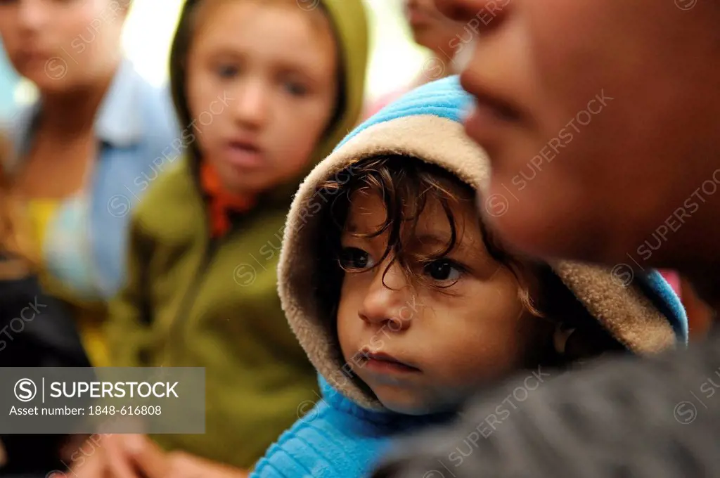 Girl during a meeting of an aid organisation that provides health services and information for mothers and children, portrait, Comunidad Martillo, Caa...
