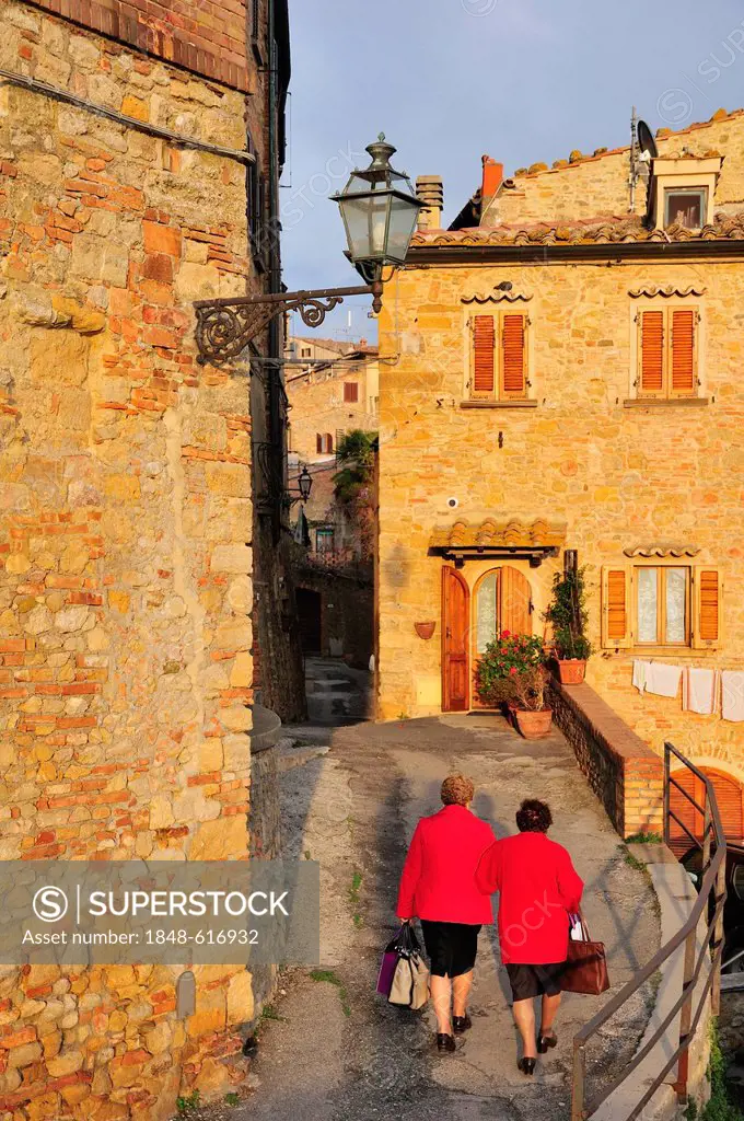 Old ladies in the historic district, Volterra, Tuscany, Italy, Europe