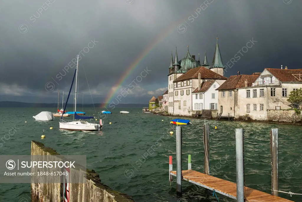 Moody light with a rainbow in the harbour of Steckborn, Lake Constance, Canton Thurgau, Switzerland, Europe