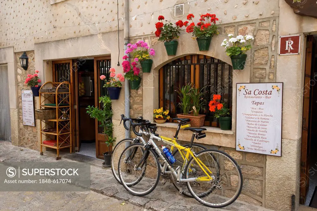Racing bikes parked outside a restaurant, Valldemossa, Valldemosa, Mallorca, Majorca, Balearic Islands, Spain, Europe
