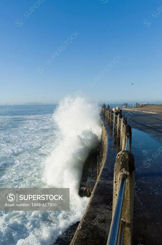 Waves breaking at the promenade, Beach Road in Cape Town, South Africa, Africa