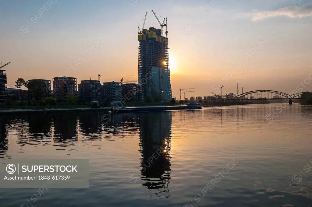 Newly constructed building of the European Central Bank, ECB, in Frankfurt am Main, at sunrise, grounds of a former wholesale market with construction...