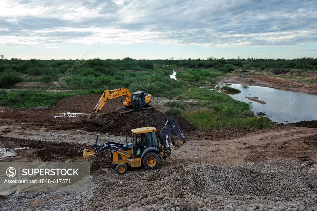 Construction works at a controversial road through the floodplains of the Pilcomayo River, a project supported by the Inter-American Development Bank,...