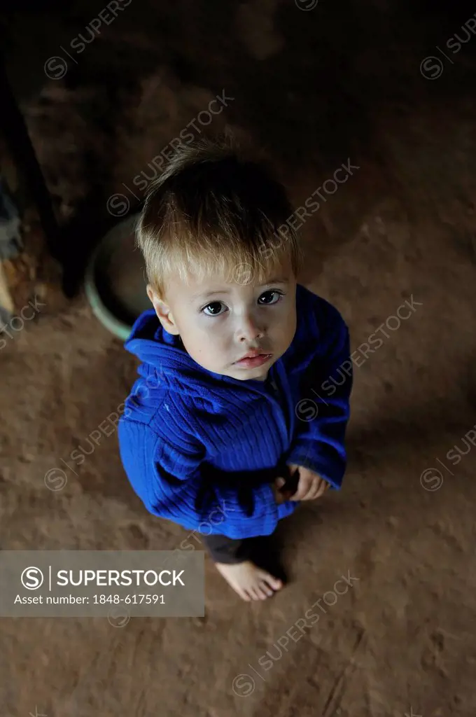 Boy looking up, Comunidad Martillo, Caaguazu, Paraguay, South America