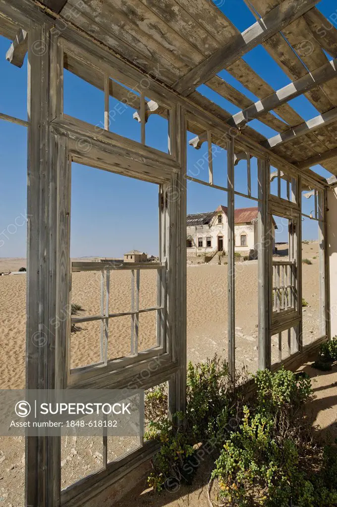 View from the porch of a ruined house, abandoned diamond mine, Kolmanskop, Namibia, Africa