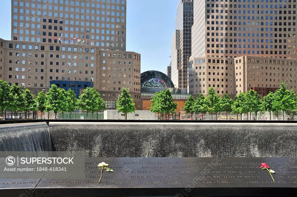 World Trade Center memorial, southern basin, the names of the victims are engraved in a bronze belt surrounding the basins, 9-11 Memorial, Ground Zero...