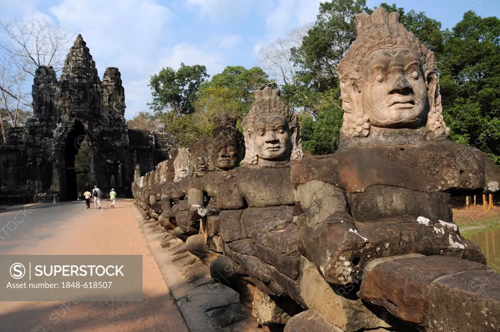 Temple guardians, sculptures in front of the Gate of Angkor Thom, Angkor, Cambodia, Asia