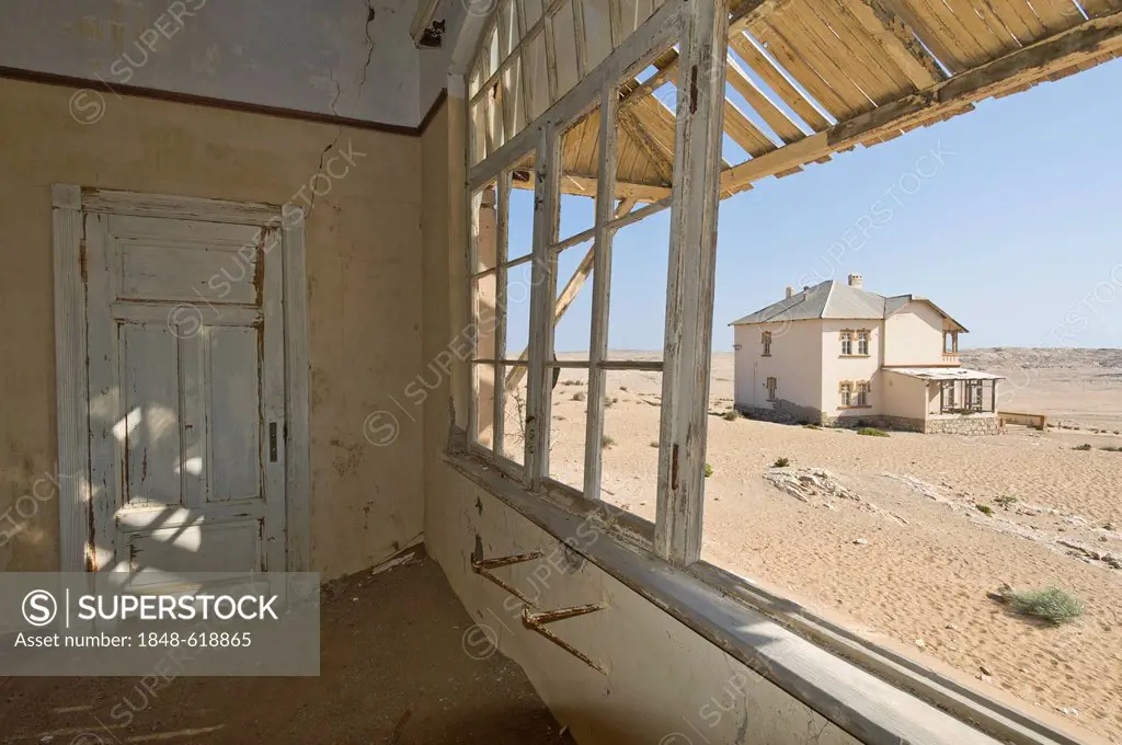 View from the porch, ruined house, abandoned diamond mine, Kolmanskop, Namibia, Africa