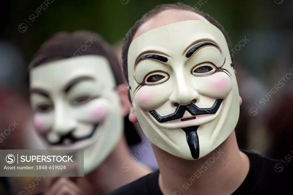 Masked demonstrators at protest against the controversial anti-piracy agreement Acta, Anti-Counterfeiting Trade Agreement, Berlin, Germany, Europe