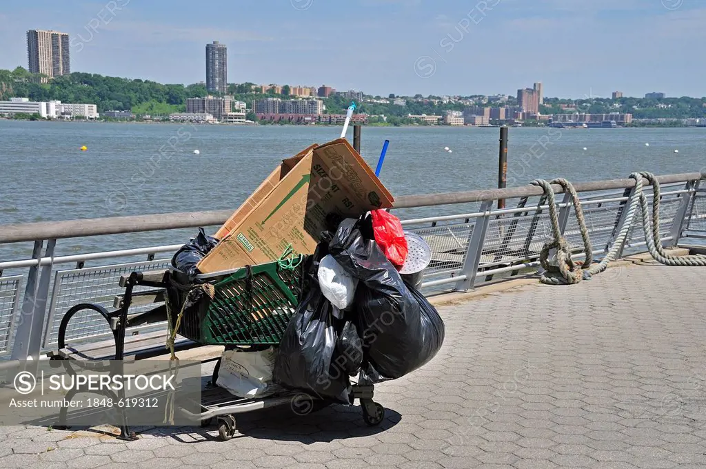 Belongings of a homeless person, shopping trolley at the Hudson River, Manhattan, New York City, USA, North America, America, PublicGround