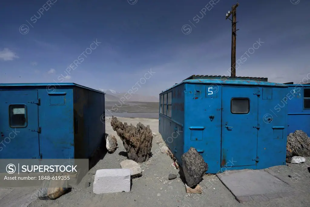 Simple blue containers, house boxes, storage containers, shops of the Kazakhs i the Kungur Moutains, Silk Road, Pamir, Xinjiang, China, Asia