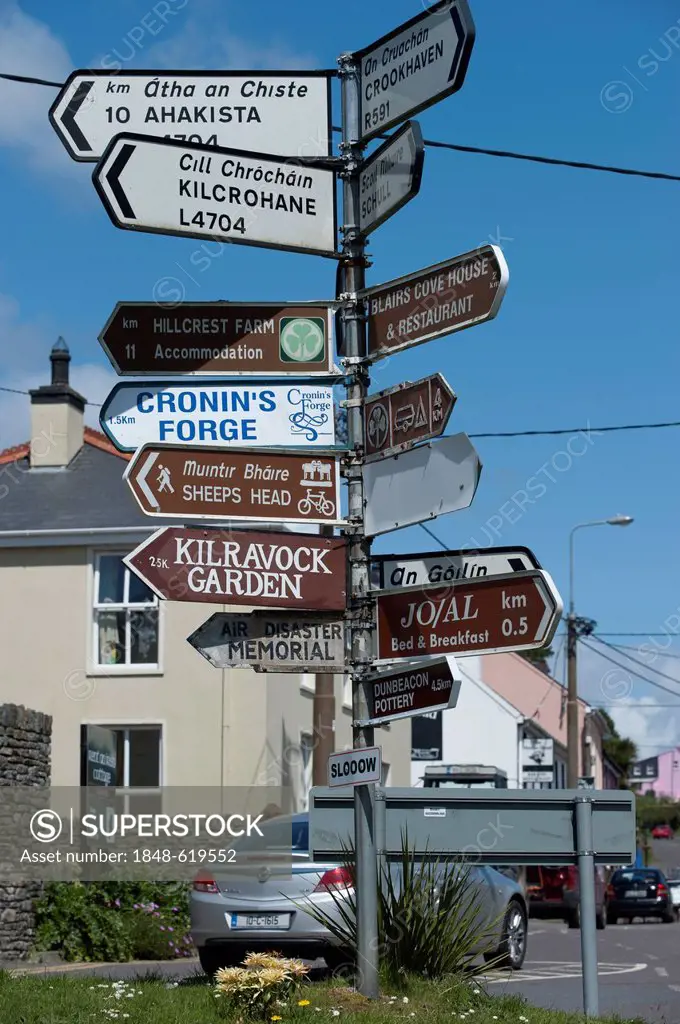 Signposts, many signs on a post, County Cork, Republic of Ireland, Europe