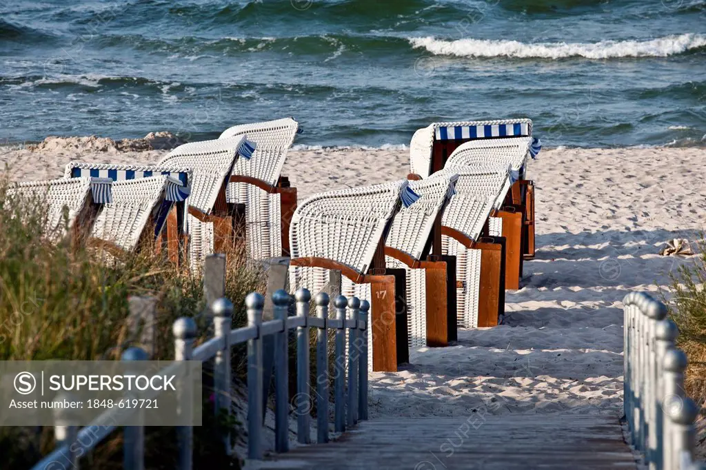 Roofed wicker beach chairs on the beach, Binz, Ruegen Island, or Rugia Island, Baltic Coast, Mecklenburg-Western Pomerania, Germany, Europe