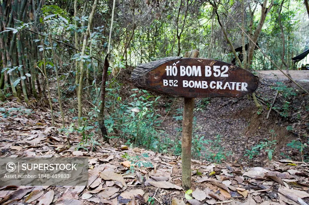 Sign, bomb crater, tunnel system of Chu Chi, Viet Cong tunnel near Saigon, Ho Chi Minh City, Vietnam, Southeast Asia