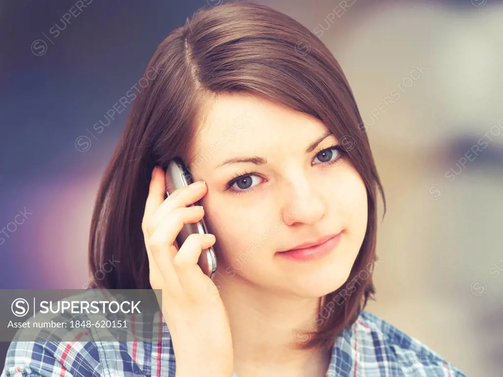 Girl speaking on a mobile phone