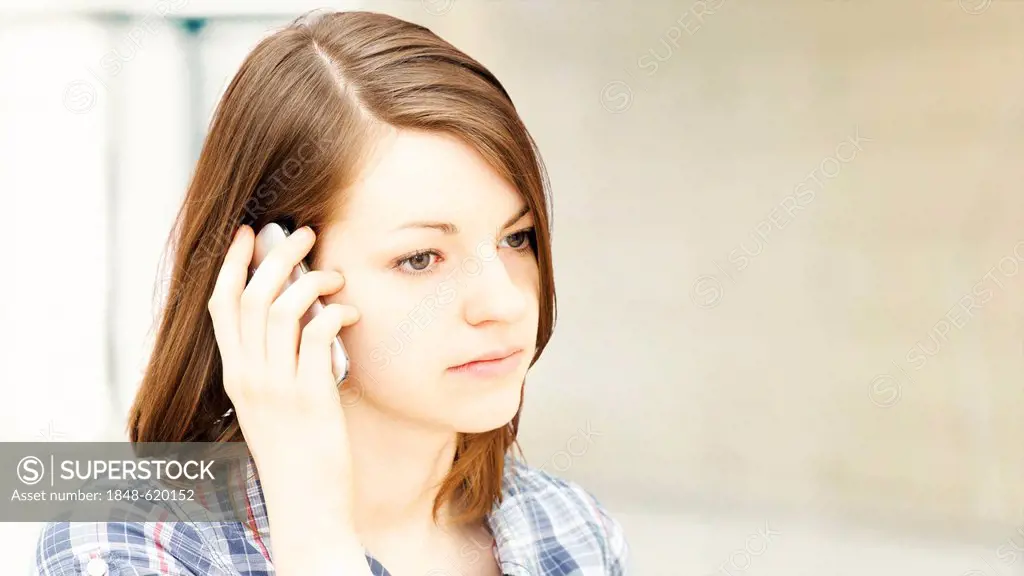 Girl speaking on a mobile phone