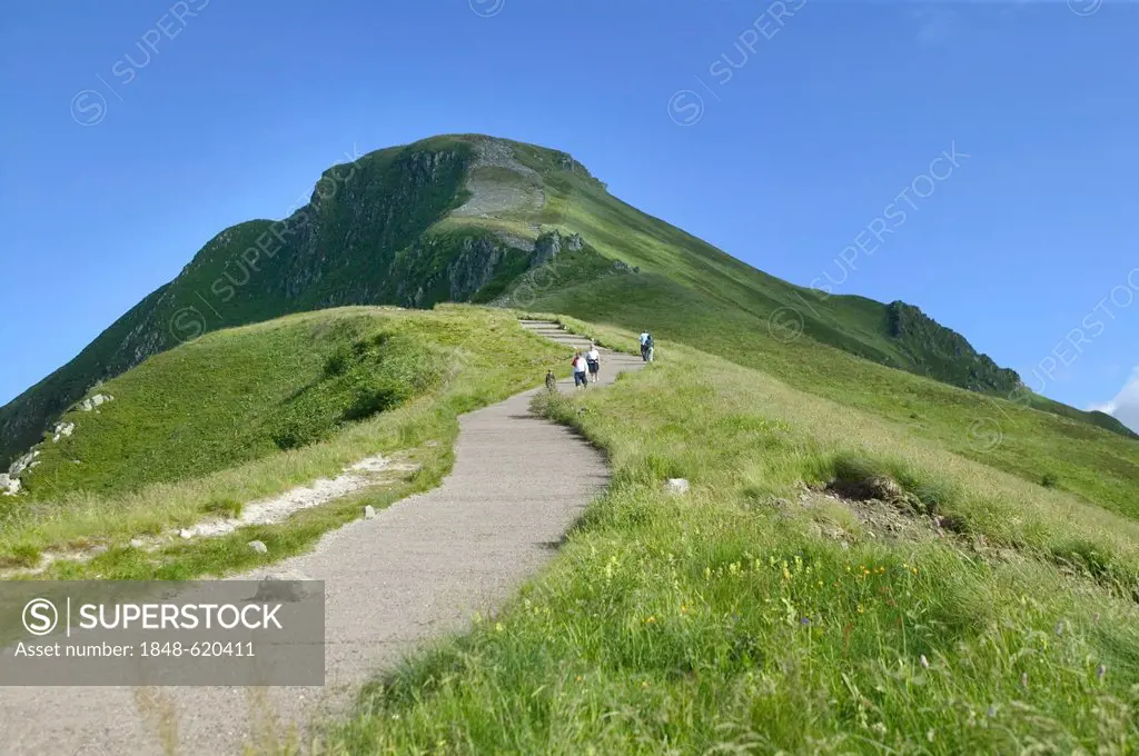 Hikers, Puy Mary mountain, Parc Naturel Regional des Volcans d'Auvergne, Auvergne Volcanoes Regional Nature Park, Cantal, France, Europe