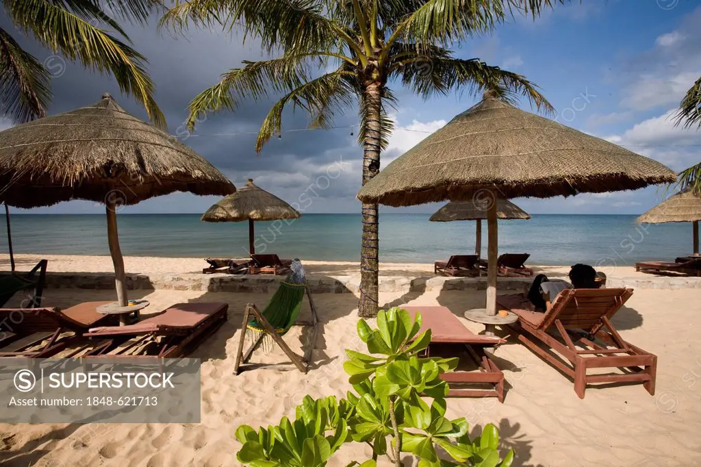 Sunshades and sun loungers on the beach, Mui Ne, Central Coast, Vietnam, Southeast Asia, Asia