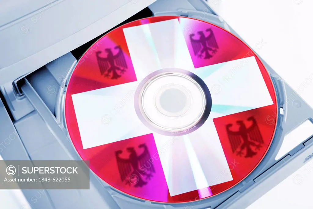 CD with Swiss cross, symbolic image for Swiss bank data