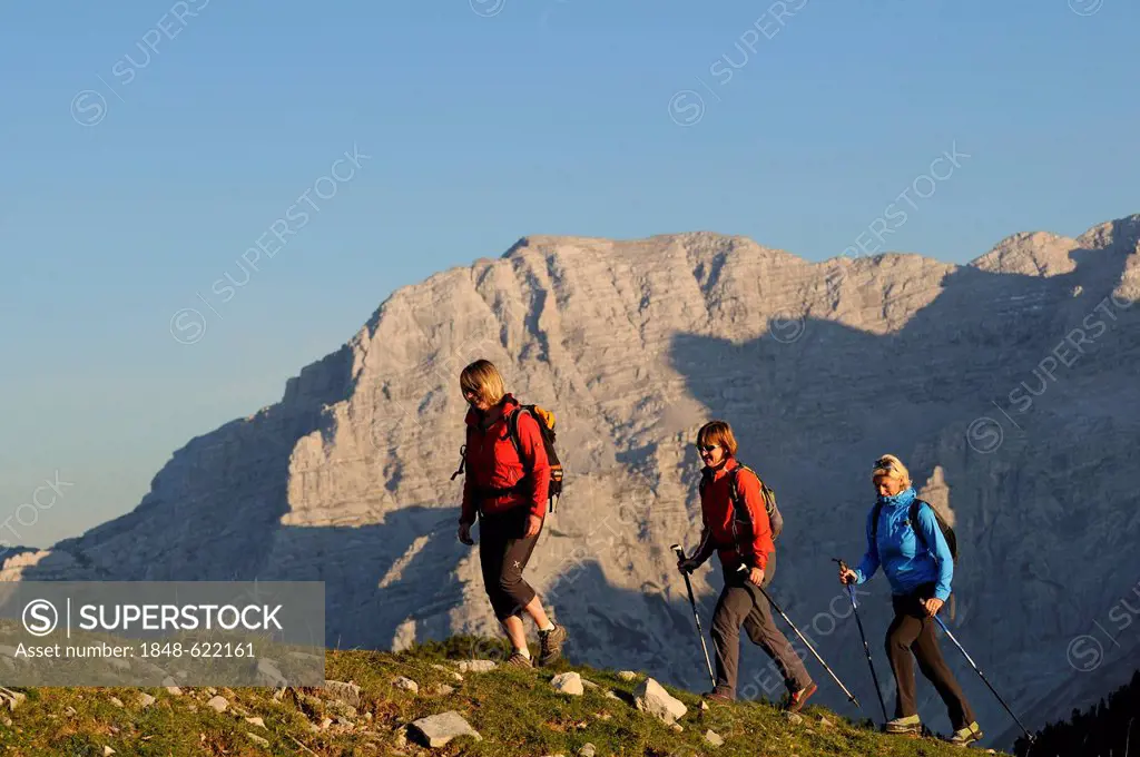 Female hikers on Mt Steinplatte, border region between Waidring, Tyrol, Austria and Reit im Winkl, Chiemgau region, Bavaria, Germany, Europe