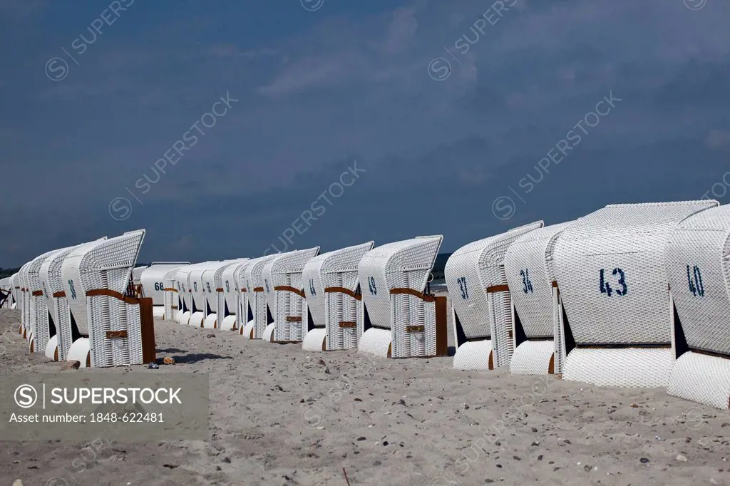 Roofed wicker beach chairs on a beach, Heringsdorf, Usedom, Mecklenburg-Western Pomerania, Germany, Europe