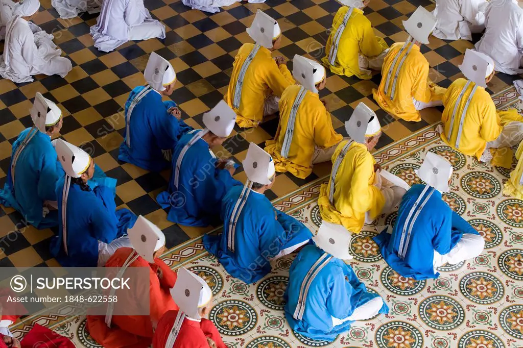 People praying in the Temple of Cao Dai, Tay Ninh, South Vietnam, Southeast Asia