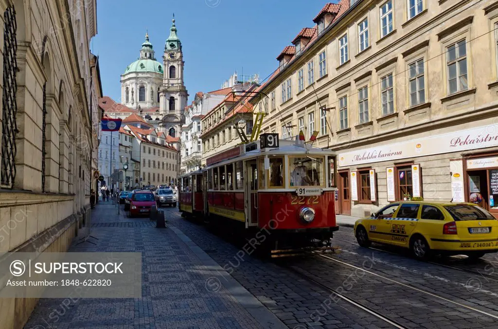 Tram, St. Nicholas Orthodox church at back, Mala Strana quarter, Prague, Czech Republic, Europe
