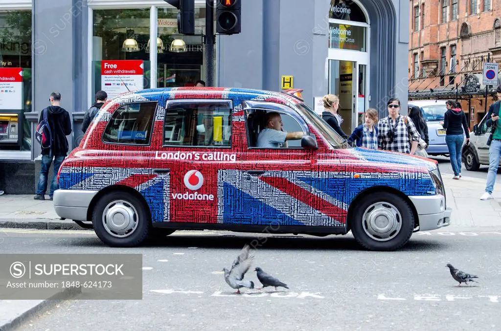 London taxi with colourful advertising, London, South England, England, United Kingdom, Europe