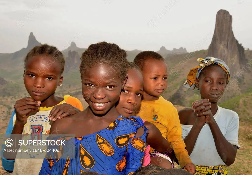 Children in front of the volcanic landscape at the village of Rhumsiki, Mandara Mountains, Cameroon, Central Africa, Africa