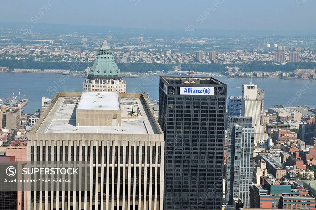 View from the observation deck Top of the Rock at the Rockefeller Center to the Exxon Building, One Worldwide Plaza and the Hudson River at back, Manh...