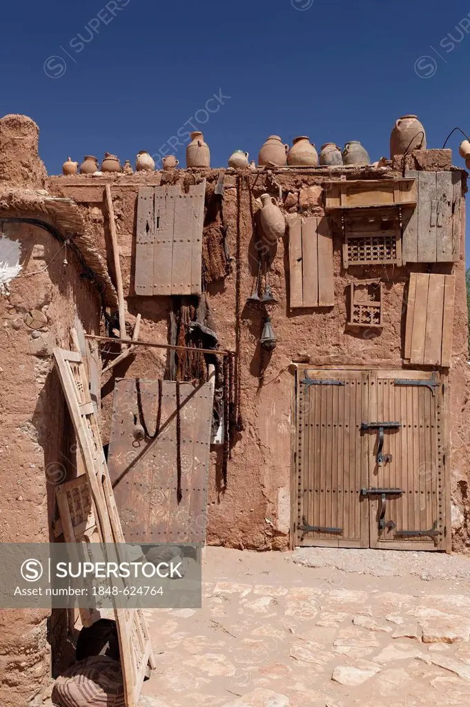 Mud brick buildings with numerous tools and clay pots, Ksar of Ait-Ben-Haddou, UNESCO World Heritage Site, near Ouarzazate, Souss-Massa-Dra, Morocco,...