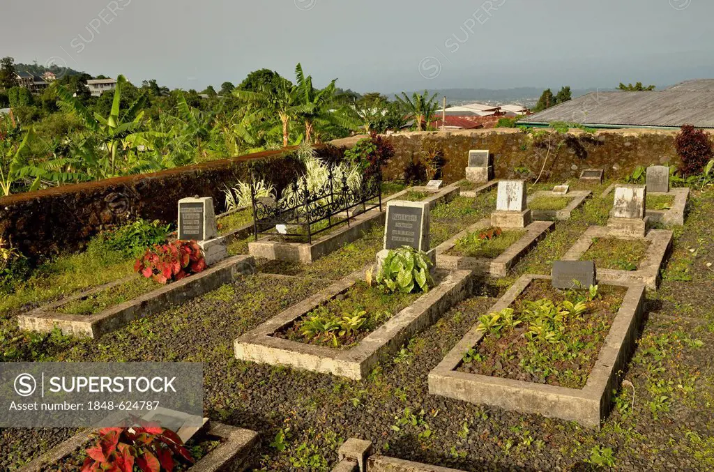 Graves on the German Cemetery in the town of Buéa at the foot of Mount Cameroon, 4095 metres, Cameroon, Central Africa, Africa