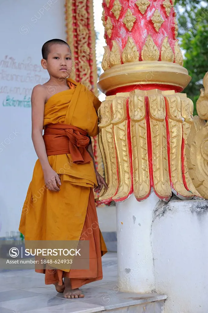 Young Buddhist monk at a temple in Vang Vieng, Laos, Southeast Asia