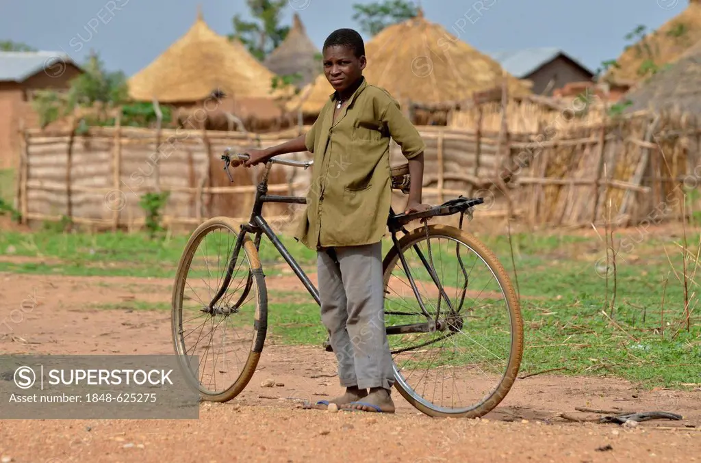 Boy with a bicycle near Garoua, Cameroon, Central Africa, Africa
