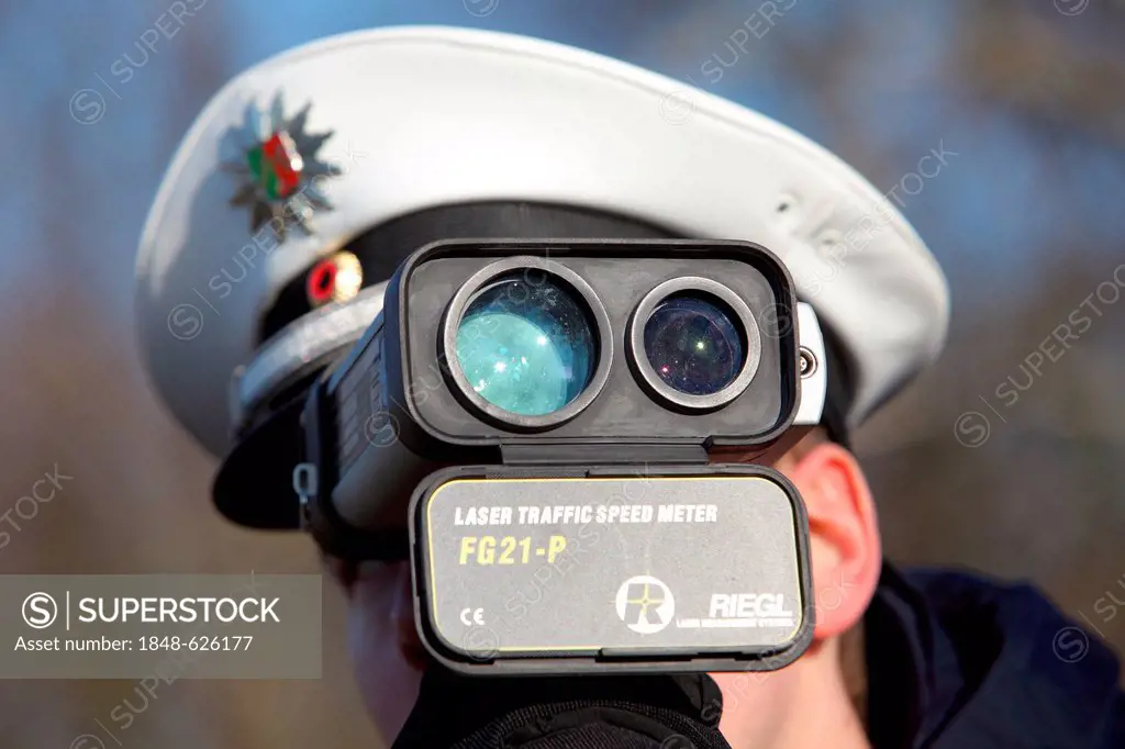 Laser measuring device being used by the police, speed trap marathon of the police in North Rhine-Westphalia, 24 hours of intensive speed controls aga...