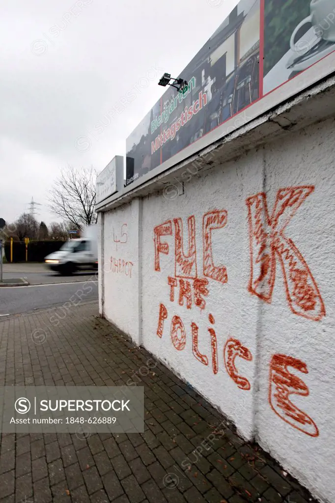 Graffiti Fuck the Police on a building wall, Seumannstrasse street, Essen, Ruhr Area, North Rhine-Westphalia, Germany, Europe