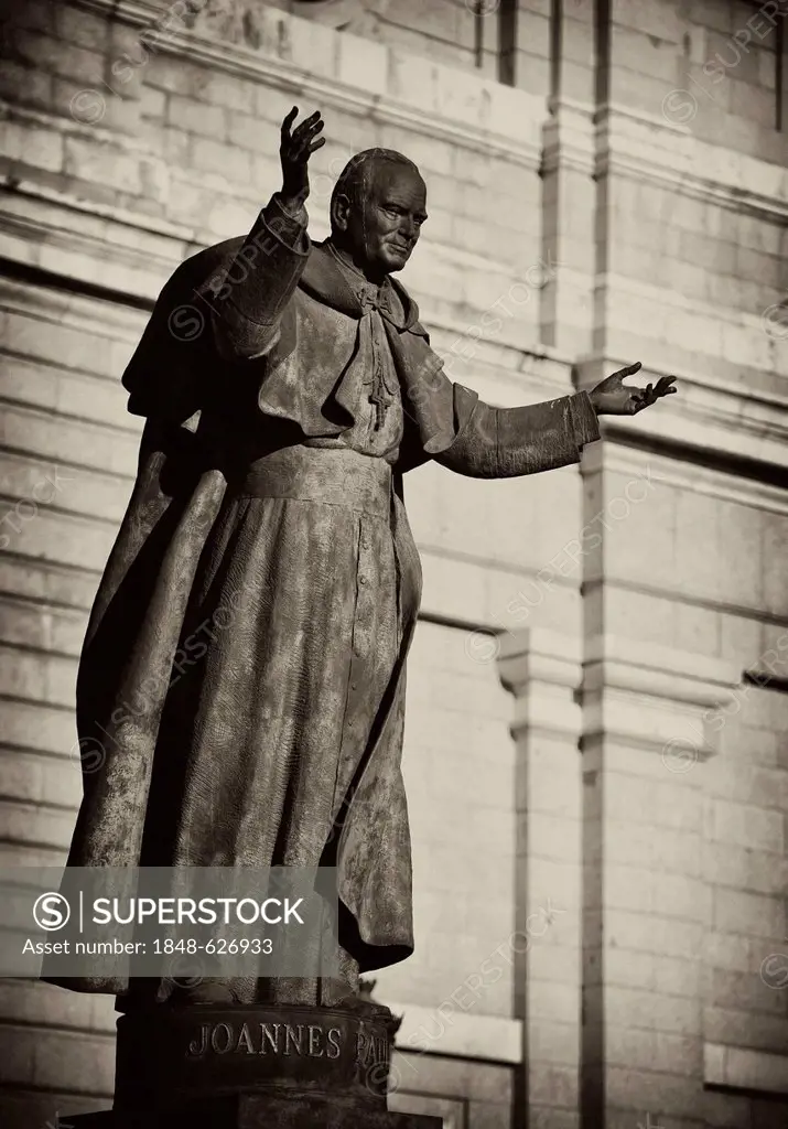 Statue of Pope John Paul II, monument, open arms, sepia, vignette, Catedral de Nuestra Señora de la Almudena cathedral, Santa María la Real de La Almu...