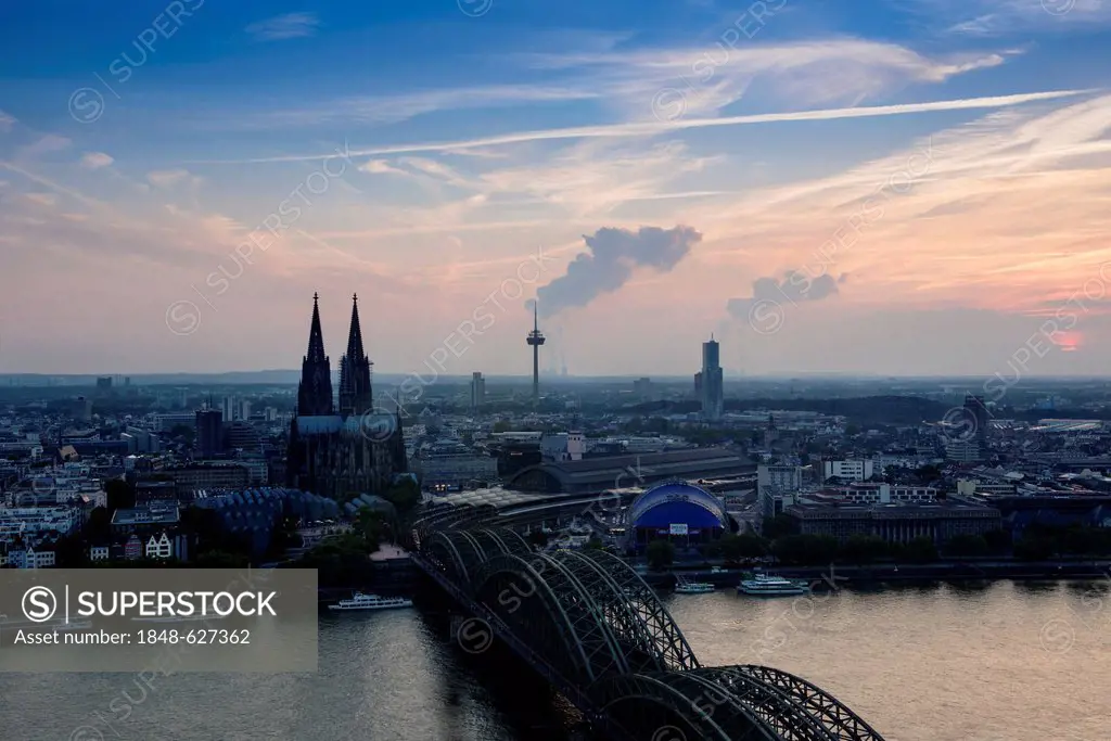 Cologne in the evening, dusk, view of Deutz Bridge, old town, Koelner Dom, Cologne Cathedral, Colonius and the Cologne Opera, Cologne, North Rhine-Wes...