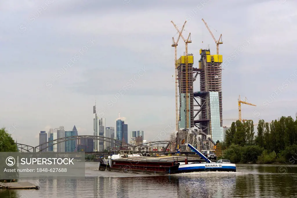 New construction of the European Central Bank, ECB, skyline in the back, cargo ship Frankfurt in front, Frankfurt am Main, Hesse, Germany, Europe, Pub...
