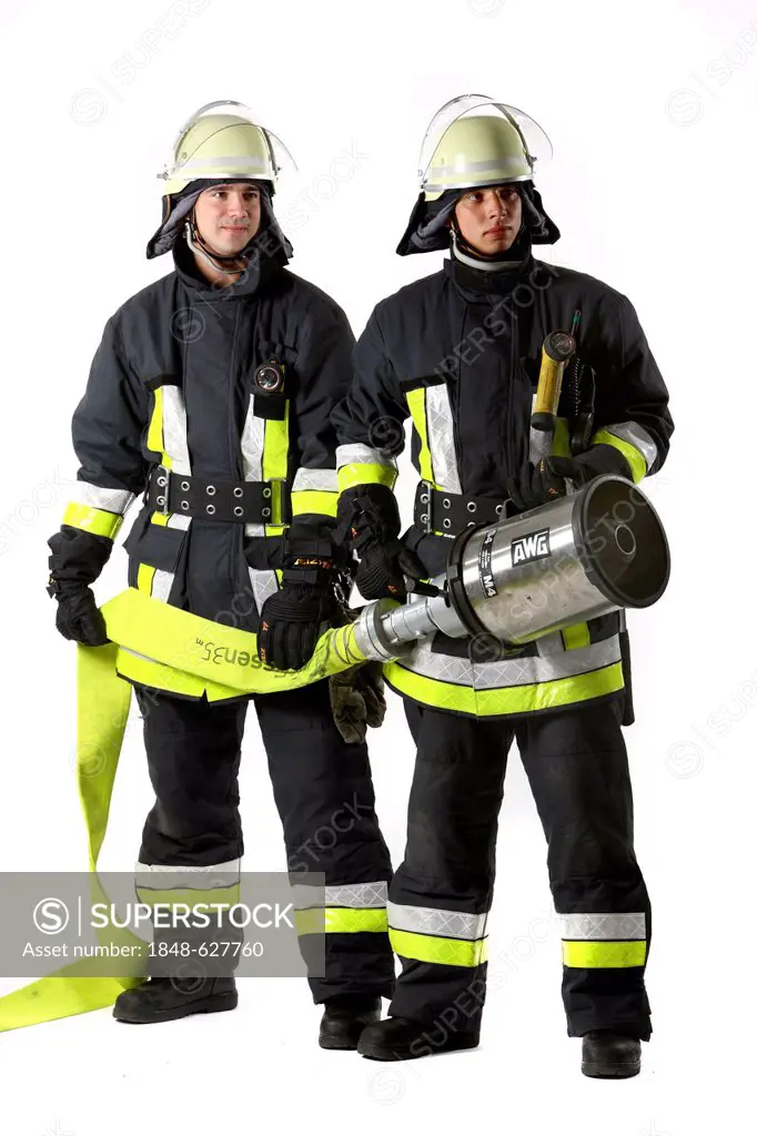 Firefighters from a fire-fighting crew holding a foam pipe for extinguishing liquid fires, professional firefighters from the Berufsfeuerwehr Essen, E...