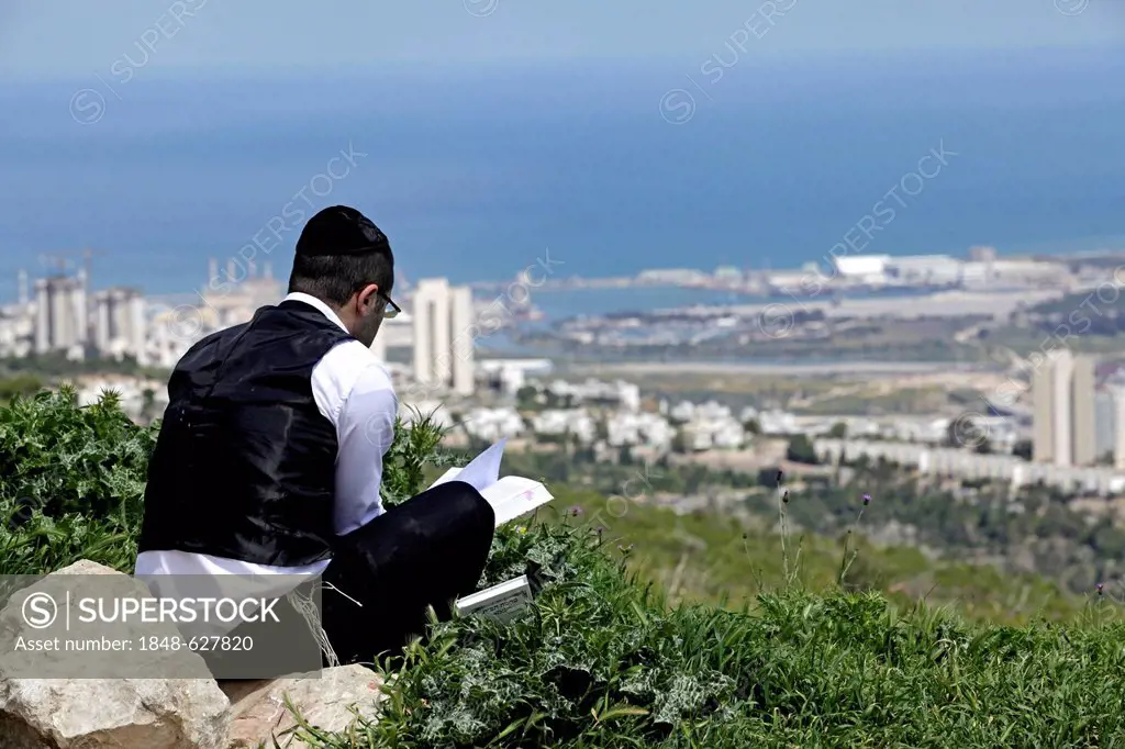 Jewish student with views over Haifa, Israel, Middle East
