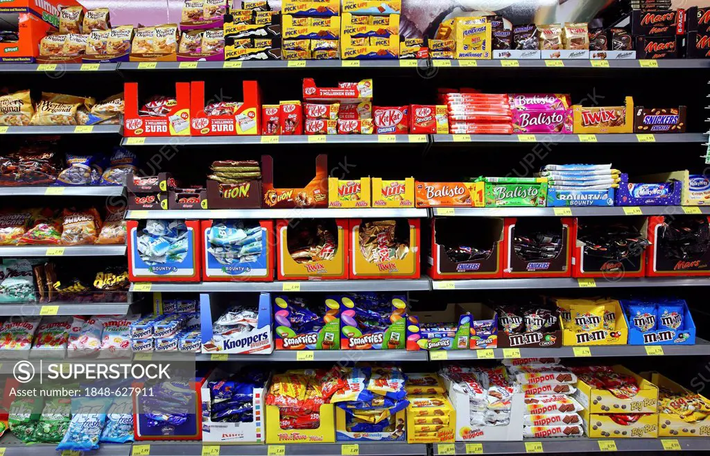 Shelves with various candies, chocolate bars, self-service, food department, supermarket, Germany, Europe